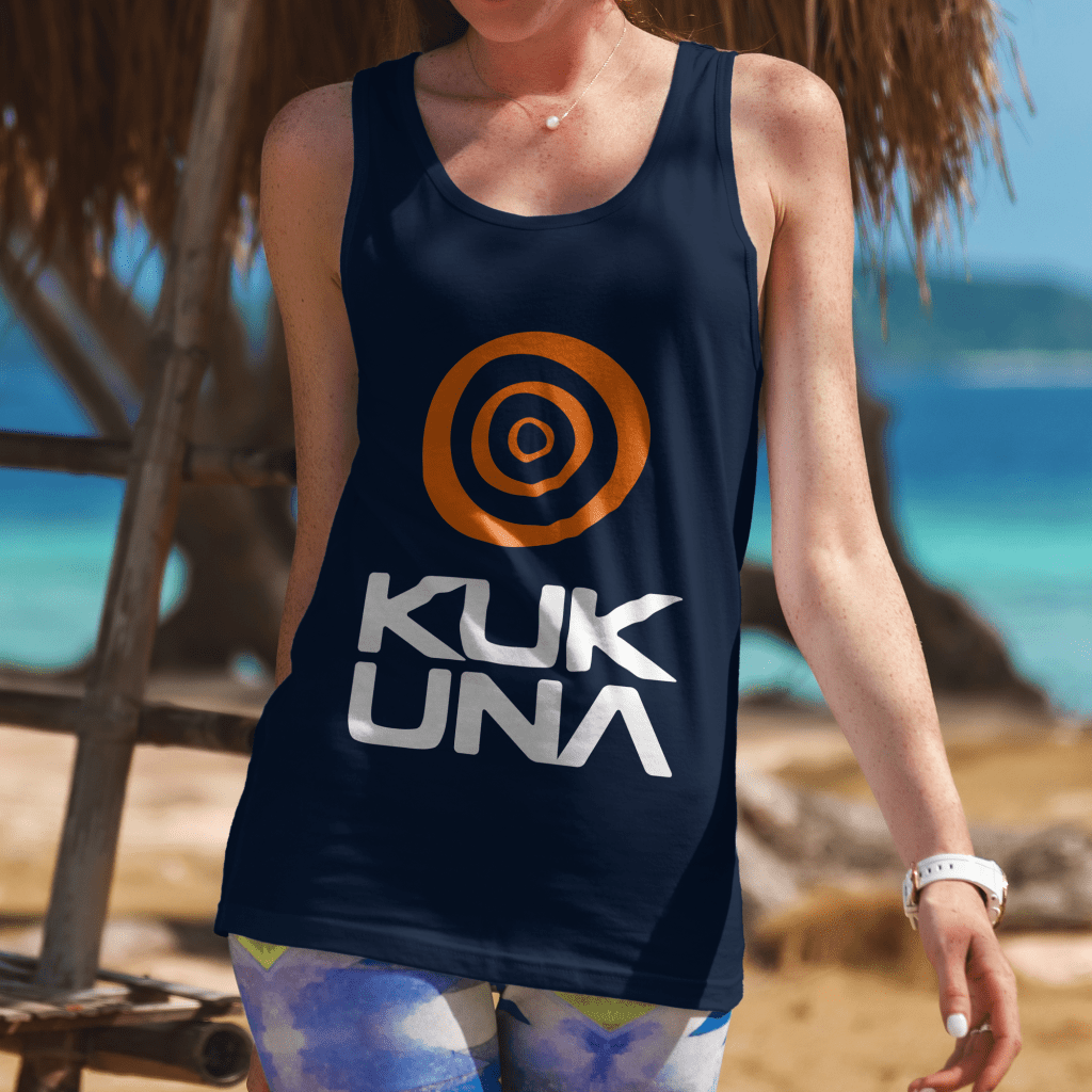 Women in a sporty vest on the beach, vest has stacked alternate version of the Kukuna logo