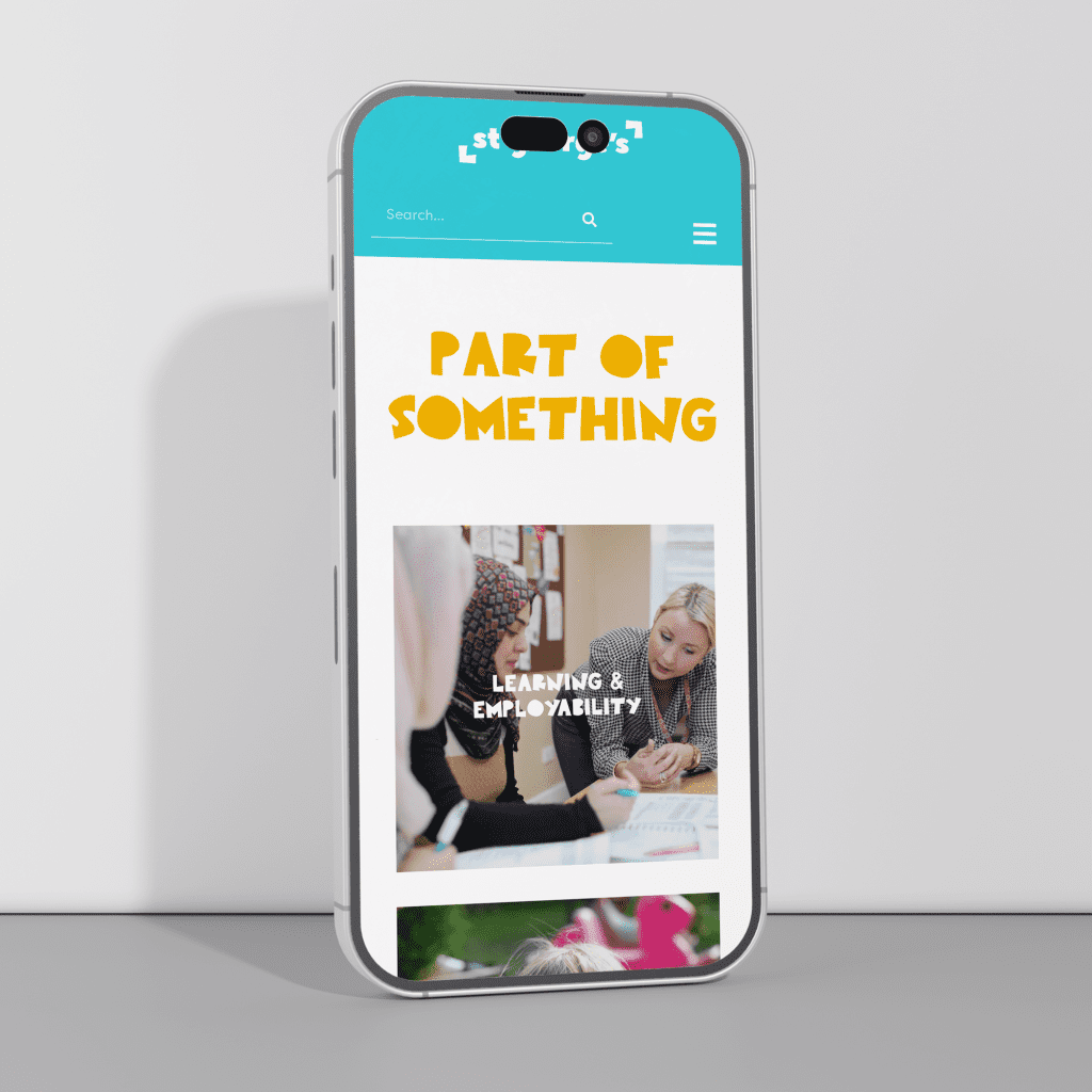 mobile phone showing web design for community hub website. Text on web page says 'Part of Something"