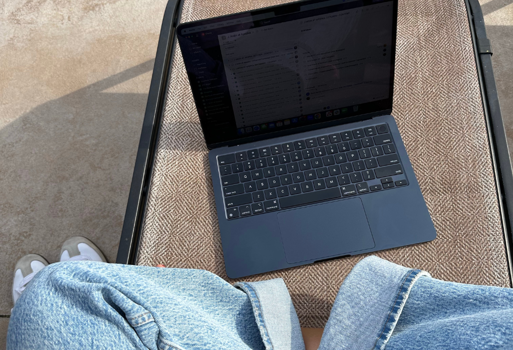 Laptop displaying a business website while writing an effective About page.